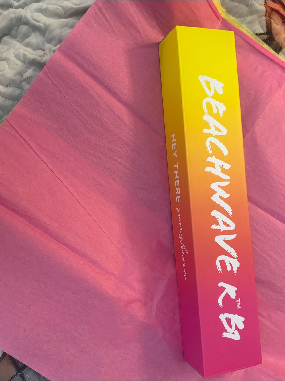 The Beachwaver Co. Pink and Yellow Bedding Accent